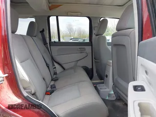 2008 Jeep Liberty Sport with VIN 1J8GN28K68W111462, listed as a IAAI auction lot 42012567 with 129,077 mi miles. Bid and sale history available at carsss.com. Image 8.