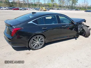 2024 Cadillac CT5 Premium Luxury with VIN 1G6DT5RK2R0131439, listed as a IAAI auction lot 42129787 with 1,801 mi miles and . Bid and sale history available at DreamBid. Image 4.