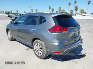 2017 Nissan Rogue SV with VIN KNMAT2MT9HP581822, listed as a IAAI auction lot 42140794 with 74,261 mi miles. Bid and sale history available at carsss.com. Image 3.