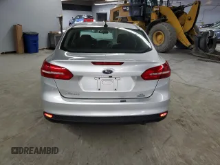 2018 Ford Focus SE z VIN 1FADP3FE0JL239152, wystawiony jako Copart lot #56789355 z przebiegiem 148 802 mil mil oraz Czysty tytuł • Clean title. Historia ofert i sprzedaży dostępna na DreamBid. Obrazek 6.