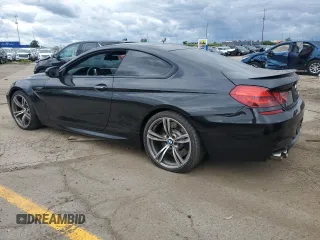 2015 BMW M6 z VIN WBSLX9C57FD160701, wystawiony jako Copart lot #57118924 z przebiegiem 60 271 mil mil oraz Tytuł czysty. Historia ofert i sprzedaży dostępna na DreamBid. Obrazek 2.