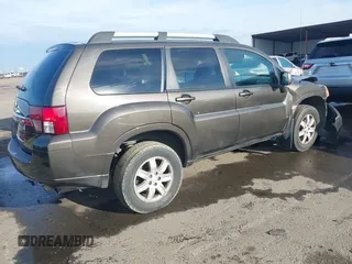 2011 Mitsubishi Endeavor LS with VIN 4A4JN2AS4BE030926, listed as a IAAI auction lot 41217100 with 154,340 mi miles. Bid and sale history available at carsss.com. Image 4.