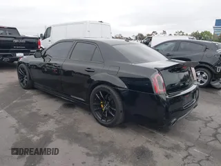 2013 Chrysler 300 SRT-8 with VIN 2C3CCAFJ9DH576184, listed as a IAAI auction lot 42162364 with 104,021 mi miles and . Bid and sale history available at carsss.com. Image 3.