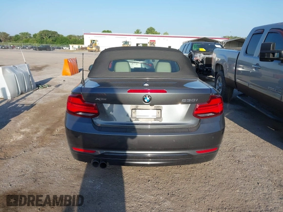 2020 BMW 2 Series 230i xDrive with VIN WBA2K1C08L7G28887, listed as a IAAI auction lot 42122785 with 30,599 mi miles and . Bid and sale history available at carsss.com. Image 16.