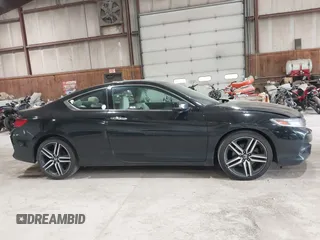 2016 Honda Accord Touring with VIN 1HGCT2B05GA002832, listed as a IAAI auction lot 42221520 with 217,435 mi miles and . Bid and sale history available at DreamBid. Image 13.