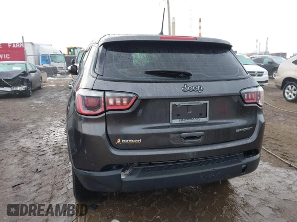 2018 Jeep Compass Sport z VIN 3C4NJCAB6JT251064, wystawiony jako IAAI lot #41457953 z przebiegiem 64 905 mil mil oraz . Historia ofert i sprzedaży dostępna na DreamBid. Obrazek 16.