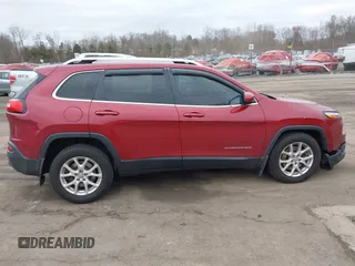 2015 Jeep Cherokee Latitude with VIN 1C4PJMCS6FW594812, listed as a IAAI auction lot 41709068 with 125,232 mi miles. Bid and sale history available at carsss.com. Image 13.