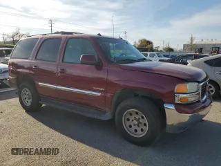 2003 GMC Yukon SLE with VIN 1GKEK13T33J320993, listed as a Copart auction lot 47828485 with 126,912 mi miles and Salvage Title. Bid and sale history available at carsss.com. Image 4.