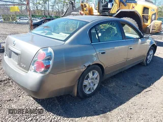 2006 Nissan Altima 2.5 S with VIN 1N4AL11D66N422455, listed as a IAAI auction lot 42008153 with 999,999 mi miles. Bid and sale history available at carsss.com. Image 4.