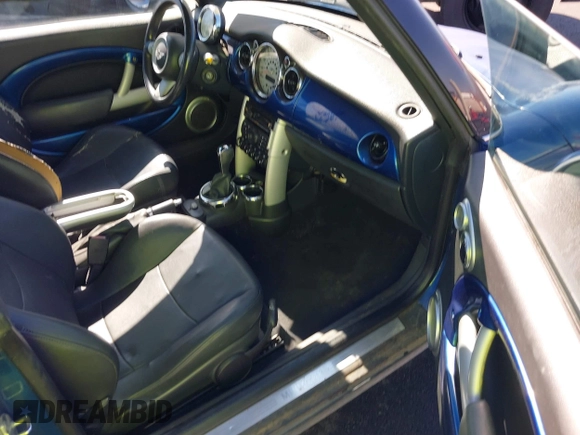 2007 MINI Convertible with VIN WMWRF33507TG16644, listed as a IAAI auction lot 40058098 with 163,215 mi miles and . Bid and sale history available at DreamBid. Image 5.