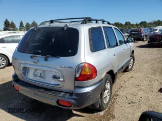 2003 Hyundai Santa Fe with VIN KM8SB12B13U405056, listed as a Copart auction lot 73671484 with 0 mi miles and Salvage Title. Bid and sale history available at carsss.com. Image 3.