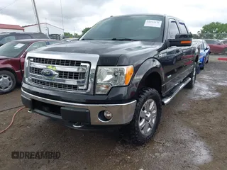 2013 Ford F-150 XL with VIN 1FTFW1ET0DFA03565, listed as a IAAI auction lot 42311111 with 240,000 mi miles and . Bid and sale history available at DreamBid. Image 2.