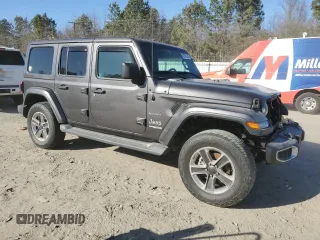 2020 Jeep Wrangler Unlimited Sahara with VIN 1C4HJXEN4LW152779, listed as a Copart auction lot 42696255 with Not provided miles and Salvage title. Bid and sale history available at DreamBid. Image 4.