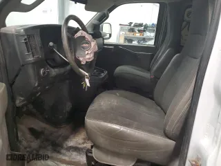 2019 GMC Savana Cargo Van with VIN 1GTW7AFGXK1363256, listed as a Copart auction lot 86720514 with 128,927 mi miles and Salvage Title. Bid and sale history available at carsss.com. Image 7.