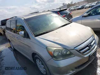 2005 Honda Odyssey TOURING with VIN 5FNRL38875B005926, listed as a IAAI auction lot 42007315 with 1 mi miles. Bid and sale history available at carsss.com. Image 1.