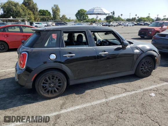2021 MINI Hardtop 4 Door Cooper S с VIN WMWXU9C06M2N01629, выставлен на аукционе Copart как лот 65398605 с пробегом 74 356 миль миль и Списание • Salvage title. История ставок и продаж доступна на DreamBid. Изображение 3.
