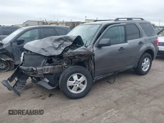 2012 Ford Escape XLT with VIN 1FMCU0D70CKB57640, listed as a IAAI auction lot 42364980 with 122,652 mi miles and . Bid and sale history available at DreamBid. Image 2.