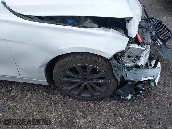 2018 BMW 3 Series 320i xDrive with VIN WBA8E5G52JNU46803, listed as a IAAI auction lot 41869625 with 67,057 mi miles. Bid and sale history available at carsss.com. Image 12.