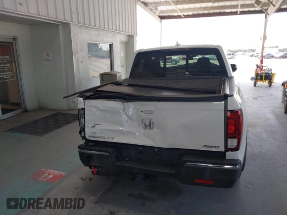 2020 Honda Ridgeline RTL-E with VIN 5FPYK3F71LB005028, listed as a IAAI auction lot 42167883 with 81,882 mi miles and . Bid and sale history available at DreamBid. Image 16.
