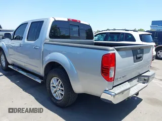 2015 Nissan Frontier SV with VIN 1N6AD0ER1FN726314, listed as a IAAI auction lot 42532117 with 61,991 mi miles and . Bid and sale history available at DreamBid. Image 3.