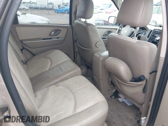 2007 Mercury Mariner Luxury with VIN 4M2YU91187KJ14159, listed as a IAAI auction lot 42576802 with 166,027 mi miles and . Bid and sale history available at DreamBid. Image 8.
