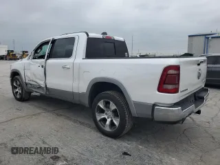 2019 Ram 1500 Laramie z VIN 1C6SRFJTXKN654141, wystawiony jako Copart lot #57014245 z przebiegiem 89 070 mil mil oraz Szkoda całkowita • Salvage title. Historia ofert i sprzedaży dostępna na DreamBid. Obrazek 2.
