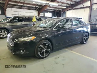 2015 Ford Fusion SE z VIN 3FA6P0H98FR156634, wystawiony jako Copart lot #67015635 z przebiegiem 183 359 mil mil oraz Czysty tytuł • Clean title. Historia ofert i sprzedaży dostępna na DreamBid. Obrazek 1.