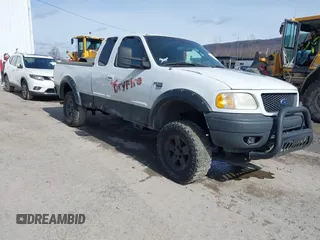 2002 Ford F-150 XL z VIN 2FTRX18W02CA91137, wystawiony jako IAAI lot #41694740 z przebiegiem 197 202 mil mil oraz . Historia ofert i sprzedaży dostępna na DreamBid. Obrazek 1.