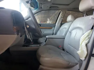 2001 Lincoln Continental with VIN 1LNHM97V31Y622782, listed as a Copart auction lot 74023344 with 116,672 mi miles and Salvage Title. Bid and sale history available at carsss.com. Image 7.