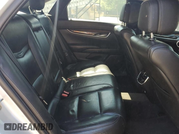 2013 Cadillac XTS Luxury с VIN 2G61P5S3XD9189744, выставлен на аукционе Copart как лот 54391535 с пробегом 132 841 миль миль и Списание • Salvage title. История ставок и продаж доступна на DreamBid. Изображение 10.