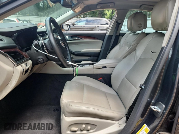 2014 Cadillac CTS RWD with VIN 1G6AP5SX7E0154156, listed as a Copart auction lot 62586325 with 83,818 mi miles and Salvage title. Bid and sale history available at DreamBid. Image 7.