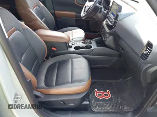 2023 Ford Bronco Sport Outer Banks z VIN 3FMCR9C64PRD05448, wystawiony jako IAAI lot #42375732 z przebiegiem 53 538 mil mil oraz . Historia ofert i sprzedaży dostępna na DreamBid. Obrazek 5.