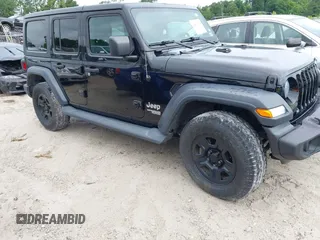 2018 Jeep Wrangler Unlimited Sport S z VIN 1C4HJXDN9JW261544, wystawiony jako IAAI lot #42431614 z przebiegiem 89 803 mil mil oraz . Historia ofert i sprzedaży dostępna na DreamBid. Obrazek 1.
