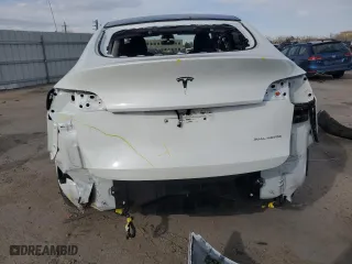 2021 Tesla Model Y Long Range with VIN 5YJYGDEEXMF299515, listed as a Copart auction lot 51978555 with 30,459 mi miles and Salvage Title. Bid and sale history available at carsss.com. Image 6.