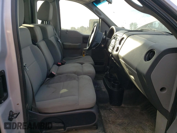 2004 Ford F-150 XL with VIN 1FTRF14W94NC46886, listed as a Copart auction lot 75828534 with 114,143 mi miles and Salvage Title. Bid and sale history available at DreamBid. Image 7.