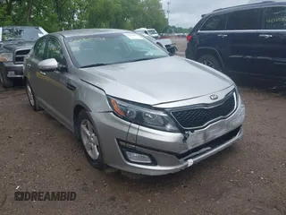 2014 Kia Optima LX with VIN KNAGM4A77E5499828, listed as a IAAI auction lot 42368453 with 175,214 mi miles and . Bid and sale history available at DreamBid. Image 1.