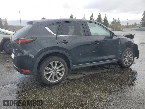 2020 Mazda CX-5 Grand Touring with VIN JM3KFADM3L0815055, listed as a Copart auction lot 48175245 with 56,602 mi miles and Salvage Title. Bid and sale history available at carsss.com. Image 3.