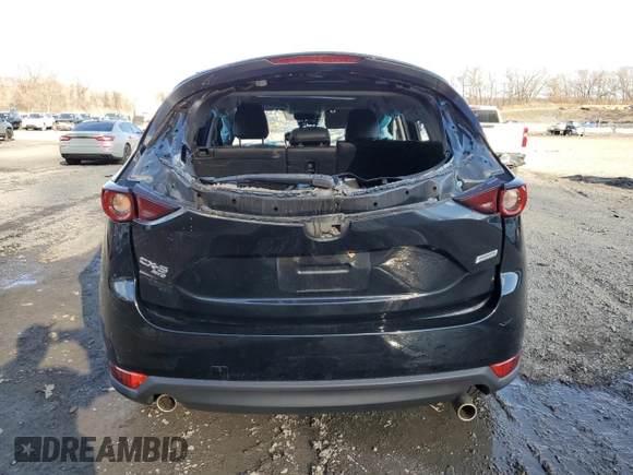 2018 Mazda CX-5 Touring with VIN JM3KFBCM3J0382258, listed as a Copart auction lot 50463005 with 61,887 mi miles and Salvage Title. Bid and sale history available at carsss.com. Image 6.