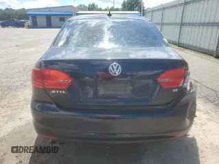 2014 Volkswagen Jetta SE with VIN 3VWD17AJ1EM366484, listed as a Copart auction lot 56331985 with 204,601 mi miles and Salvage title. Bid and sale history available at DreamBid. Image 6.