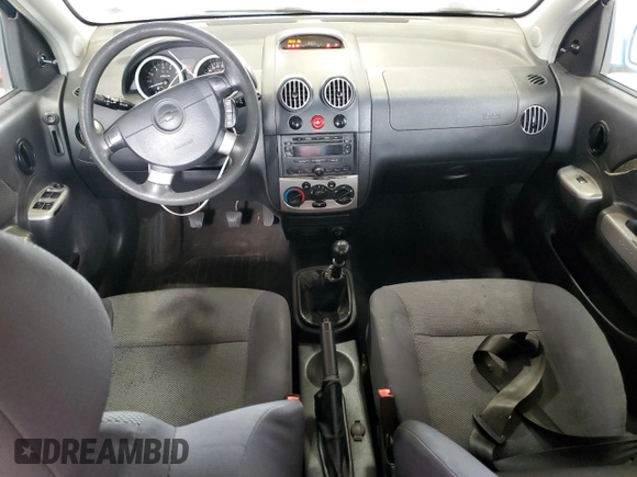 2006 Chevrolet Aveo LT with VIN KL1TG66686B652568, listed as a Copart auction lot 61491885 with 128,599 mi miles and Salvage title. Bid and sale history available at DreamBid. Image 8.