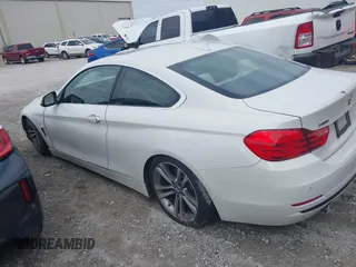 2016 BMW 4 Series 435i xDrive with VIN WBA3R5C52GK373771, listed as a IAAI auction lot 41462286 with 123,713 mi miles and . Bid and sale history available at DreamBid. Image 14.