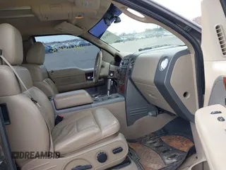 2005 Ford F-150 XLT with VIN 1FTPX14515NA43732, listed as a IAAI auction lot 41901453 with 216,729 mi miles. Bid and sale history available at carsss.com. Image 5.