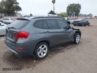 2013 BMW X1 28i with VIN WBAVM1C51DVW42577, listed as a IAAI auction lot 42029627 with 140,343 mi miles. Bid and sale history available at carsss.com. Image 4.