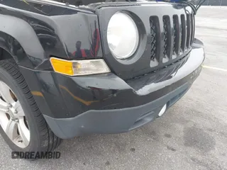 2014 Jeep Patriot Latitude with VIN 1C4NJRFB7ED713462, listed as a IAAI auction lot 42036671 with 116,276 mi miles. Bid and sale history available at carsss.com. Image 6.