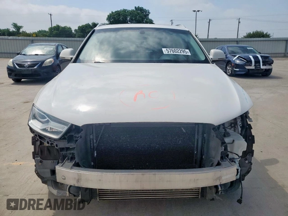 2017 Audi Q3 Premium with VIN WA1BCCFS4HR014916, listed as a Copart auction lot 57602295 with 92,348 mi miles and Salvage title. Bid and sale history available at DreamBid. Image 5.