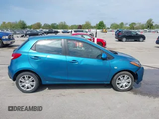 2012 Mazda 2 Sport z VIN JM1DE1KY5C0149990, wystawiony jako IAAI lot #42177069 z przebiegiem 85 371 mil mil oraz . Historia ofert i sprzedaży dostępna na DreamBid. Obrazek 13.