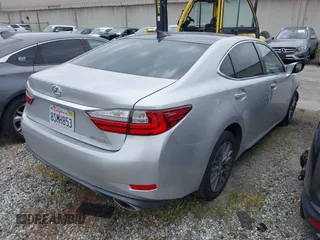 2018 Lexus ES with VIN 58ABK1GG5JU086299, listed as a IAAI auction lot 41636953 with 127,283 mi miles. Bid and sale history available at carsss.com. Image 4.