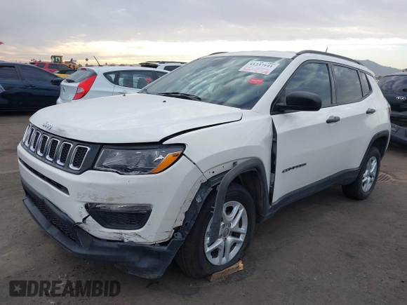 2017 Jeep Compass Sport z VIN 3C4NJDAB1HT642199, wystawiony jako IAAI lot #41237141 z przebiegiem 85 650 mil mil oraz . Historia ofert i sprzedaży dostępna na DreamBid. Obrazek 2.