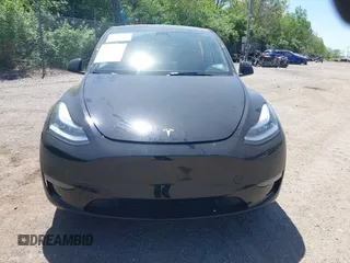 2023 Tesla Model Y Long Range with VIN 7SAYGDEE0PA111430, listed as a IAAI auction lot 42156924 with 35,950 mi miles and . Bid and sale history available at DreamBid. Image 13.