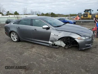 2018 Jaguar XJ Portfolio with VIN SAJWJ2GD1J8W15611, listed as a Copart auction lot 44835764 with 60,010 mi miles and . Bid and sale history available at DreamBid. Image 4.